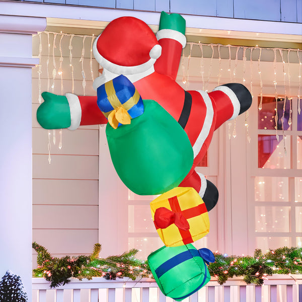 6 FT Tall Christmas Inflatable Climbing Santa with Gift Bags